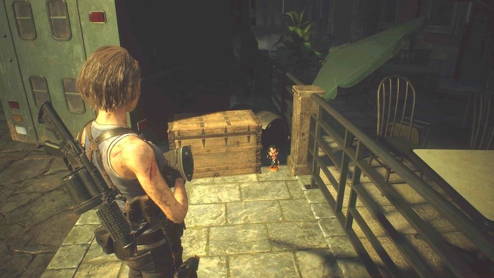 Look behind the green delivery truck in the Clocktower Plaza to find this Charlie Doll. Make sure you get everything here before crossing the bridge.